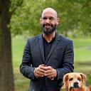 Mohammed Hassan with his dog in Shepherd's Bush Green